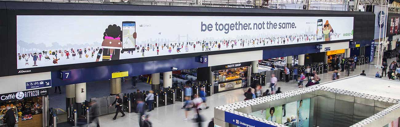The London underground with a large Android billboard showing Runtastic